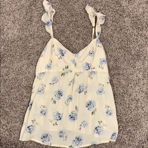 White blouse with blue flowers